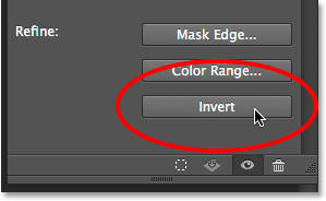 Clicking the Invert button in the mask options. 