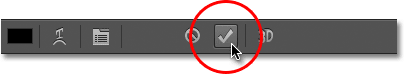 Clicking the checkmark to accept the text. Image © 2012 Photoshop Essentials.com