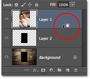 Creating a clipping mask inside the Layers panel. Image © 2012 Photoshop Essentials.com