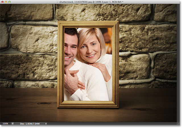 The photo is now clipped inside the frame. Image &Copy; 2012 Photoshop Essentials.com