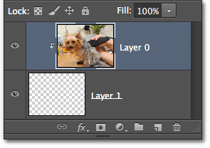 The Layers panel showing the newly created clipping mask. Image © 2012 Photoshop Essentials.com