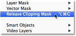 Choosing the Release Clipping Mask command from the Layer menu. Image © 2012 Photoshop Essentials.com
