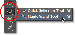 Selecting the Magic Wand Tool from the Tools panel in Photoshop. Image © 2012 Photoshop Essentials.com