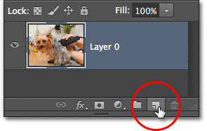 Clicking the New Layer icon in the Layers panel. Image © 2012 Photoshop Essentials.com