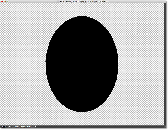 The selection outline has been filled with black. Image © 2012 Photoshop Essentials.com