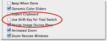 The Use Shift Key For Tool Switch option in the Photoshop Preferences. Image © 2010 Steve Patterson, Photoshop Essentials.com