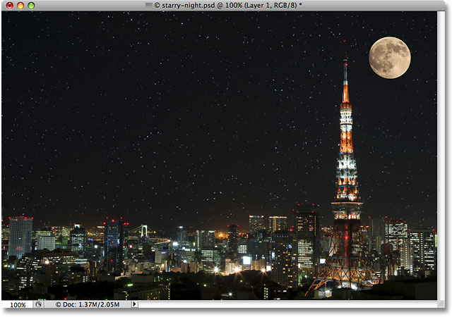 A photo of a moon over the city at night. Image © 2009 Photoshop Essentials.com