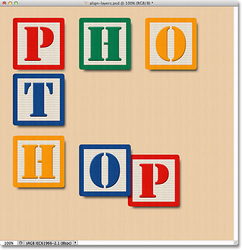 The bottom three blocks appear in the document. Image © 2011 Photoshop Essentials.com