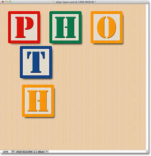 The Middle Left and Bottom Left blocks appear in the document. Image © 2011 Photoshop Essentials.com