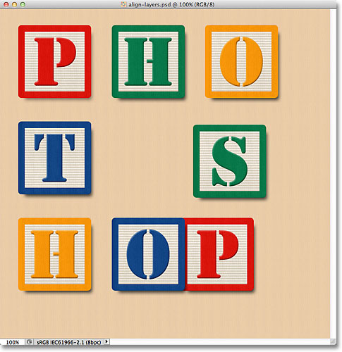 The block on the Middle Right layer becomes visible. Image © 2011 Photoshop Essentials.com