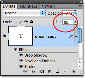 Lowering the Fill value of the text to 0%, with layer styles applied to the text. Image © 2011 Photoshop Essentials.com