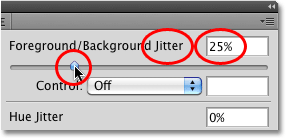 Setting the Foreground/Background Jitter option to 25%. Image © 2010 Photoshop Essentials.com