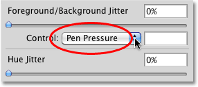 Setting the Foreground/Background option in the Color Dynamic section to Pen Pressure. Image © 2010 Photoshop Essentials.com
