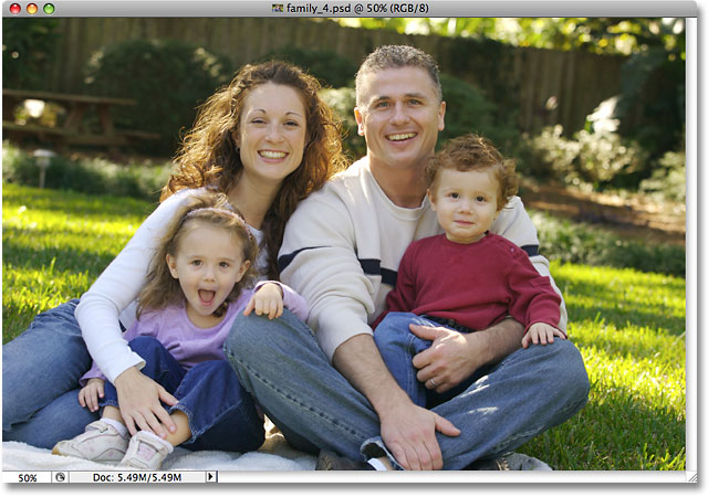 A photo of a family open in Photoshop. Image licensed from iStockphoto by Photoshop Essentials.com.