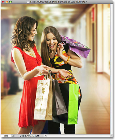 A photo of two women shopping. Image licensed from iStockphoto by Photoshop Essentials.com