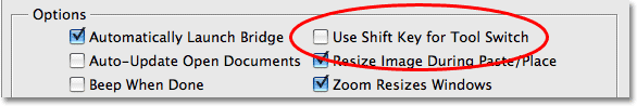 The 'Use Shift Key For Tool Switch' option in the Photoshop CS3 Preferences. Image © 2009 Photoshop Essentials.com