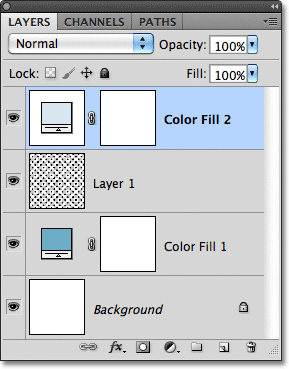 A new solid color fill layer has been added in the Layers panel. Image © 2011 Photoshop Essentials.com