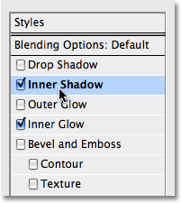 Choosing Inner Shadow from the Layer Style dialog box in Photoshop. Image © 2008 Photoshop Essentials.com.
