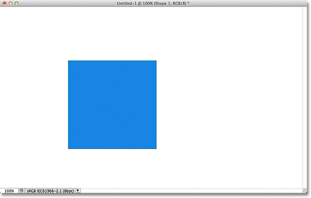 The blue shape re-appears after turning the vector mask back on. Image © 2011 Photoshop Essentials.com