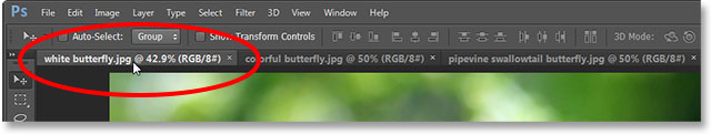 Selecting the first tabbed document. Image © 2013 Photoshop Essentials.com