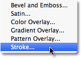 Selecting a Stroke layer style. Image © 2010 Photoshop Essentials.com