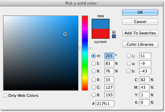Choosing blue from the Color Picker in Photoshop. Image © 2011 Photoshop Essentials.com