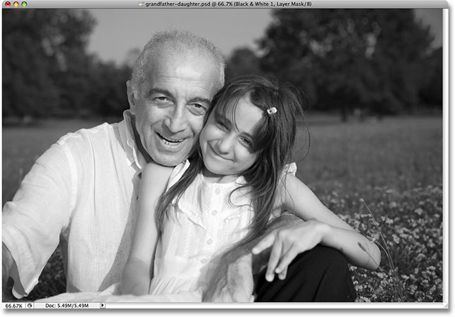 The skin tones now appear lighter in the black and white version. Image © 2009 Photoshop Essentials.com.
