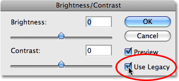 The 'Use Legacy' option in the Brightness/Contrast dialog box in Photoshop. Image © 2009 Photoshop Essentials.com