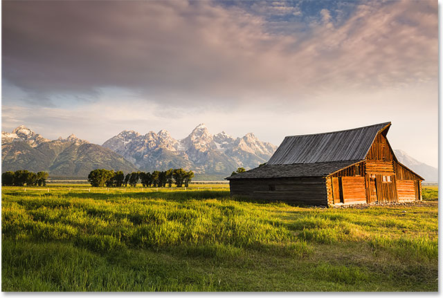 Iconic T. A. Moulton barn and Teton peaks at dawn in Grand Teton National Park, WY.  Image licensed from Shutterstock by Photoshop Essentials.com