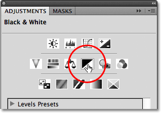 Choosing a Black and White adjustment layer from the Adjustments panel in Photoshop. Image © 2012 Photoshop Essentials.com