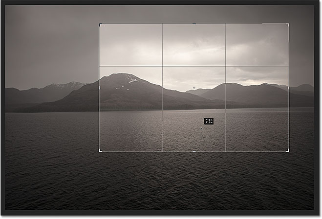 Click and drag the photo around inside the crop box to reposition it. Image © 2012 Photoshop Essentials.com