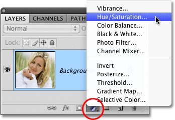 Selecting a Hue/Saturation adjustment layer in Photoshop. Image © 2010 Photoshop Essentials.com