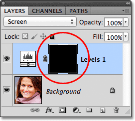 The layer mask thumbnail for the adjustment layer is now filled with black. Image © 2012 Photoshop Essentials.com