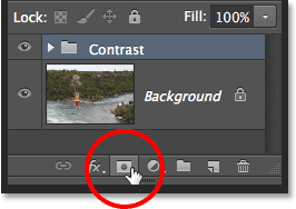 Clicking the Add Layer Mask icon in the Layers panel. Image © 2013 Steve Patterson, Photoshop Essentials.com.