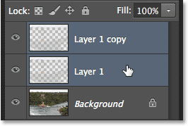 Selecting two layers at once in the Layers panel. Image © 2013 Steve Patterson, Photoshop Essentials.com.