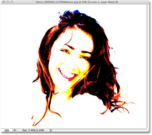 Dragging the black point slider with Show Clipping enabled in Photoshop CS3. Image © 2009 Photoshop Essentials.com.