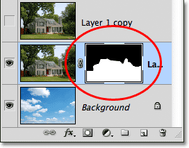 A layer mask has been added to Layer 1. Image © 2012 Photoshop Essentials.com