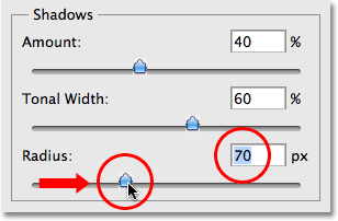 Increasing the Radius value to 70% in the Shadow/Highlight dialog box. Image © 2009 Photoshop Essentials.com