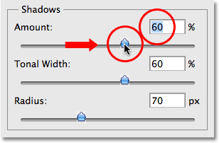 Increasing the Amount value to 70% in the Shadow/Highlight dialog box. Image © 2009 Photoshop Essentials.com