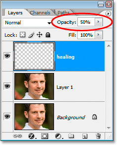 Lowering the opacity of the healing layer in the Layers palette