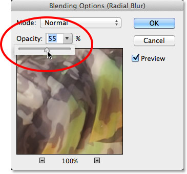 Loweing the opacity of the Radial Blur Smart Filter. Image © 2013 Photoshop Essentials.com