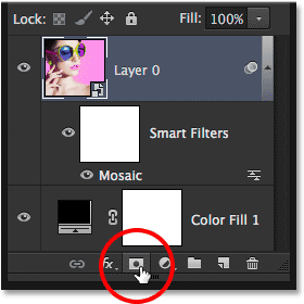 Clicking the Layer Mask icon in the Layers panel. Image © 2014 Photoshop Essentials.com.