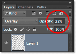 Lowering the layer opacity. Image © 2014 Photoshop Essentials.com