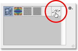 Selecting the Copyright pattern from the Pattern Picker. Image © 2014 Photoshop Essentials.com