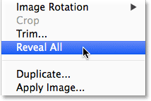 Selecting the Reveal All command from the Image menu. Image © 2014 Photoshop Essentials.com
