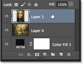Selecting the top image layer. Image © 2014 Photoshop Essentials.com