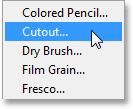 Selecting the Cutout filter from the Filter menu. Image © 2013 Photoshop Essentials.com