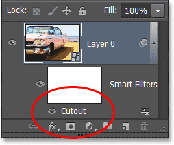 The Layers panel showing the Cutout Smart Filter. Image © 2013 Photoshop Essentials.com