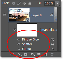 Each Smart Filter is now listed by its actual name in the Layers panel. Image © 2013 Photoshop Essentials.com