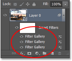 Three Smart Filters listed in the Layers panel only as 'Filter Gallery'. Image © 2013 Photoshop Essentials.com